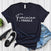 Feminine ≠ Fragile – Women’s Graphic Tee