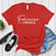 Feminine ≠ Fragile – Women’s Graphic Tee
