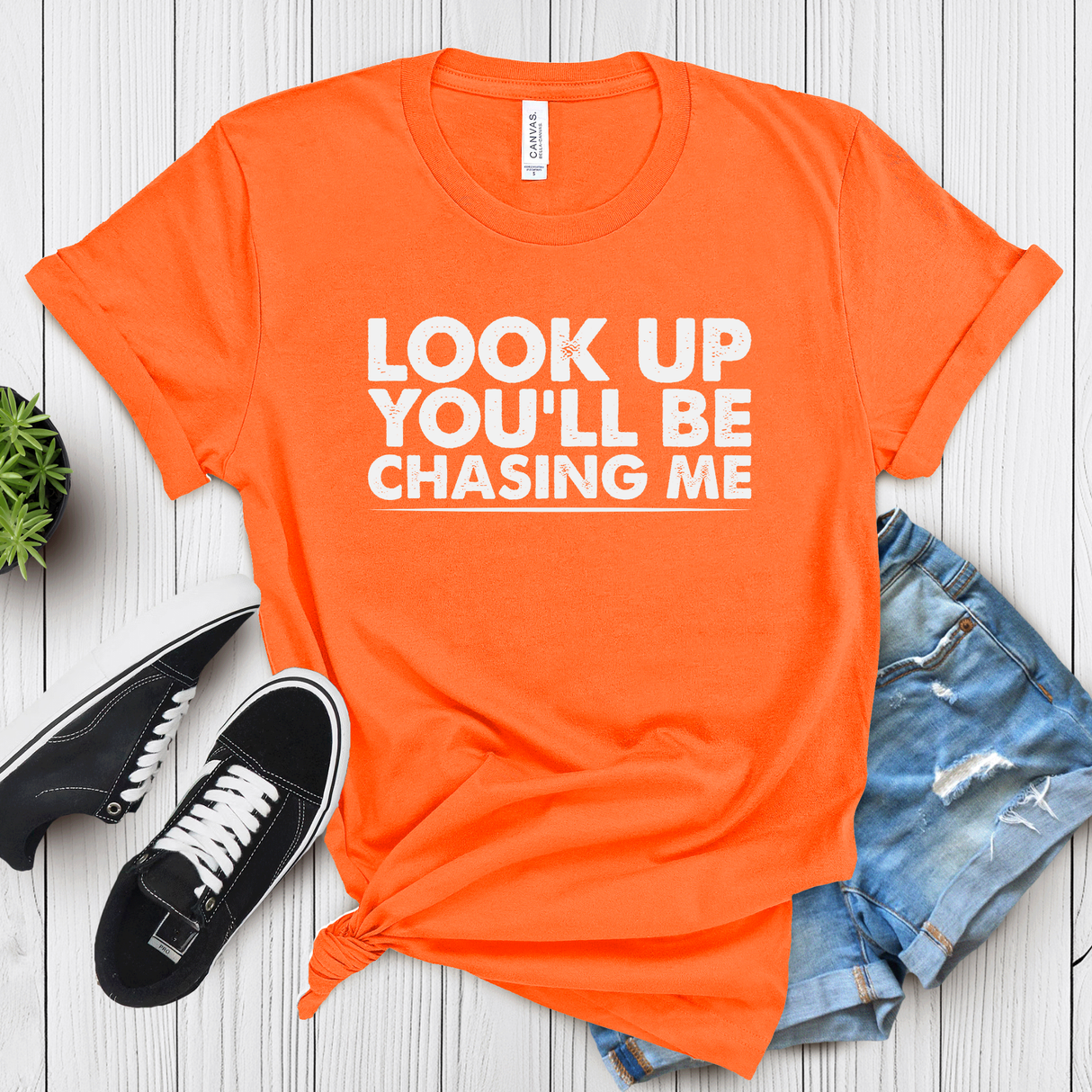 Look Up You’ll Be Chasing Me – Women’s Graphic Tee