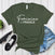 Feminine ≠ Fragile – Women’s Graphic Tee